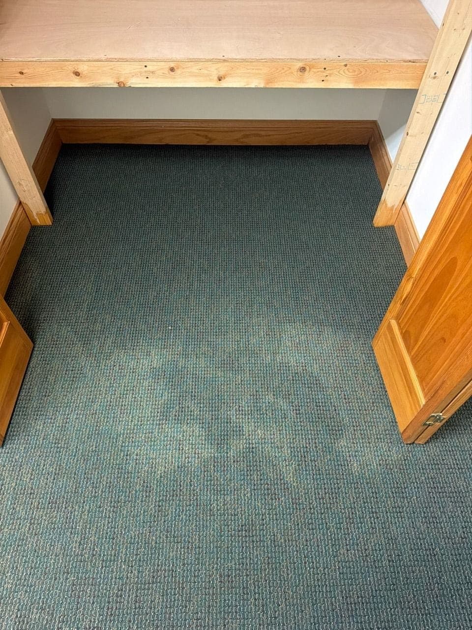 Office carpet with large water stains