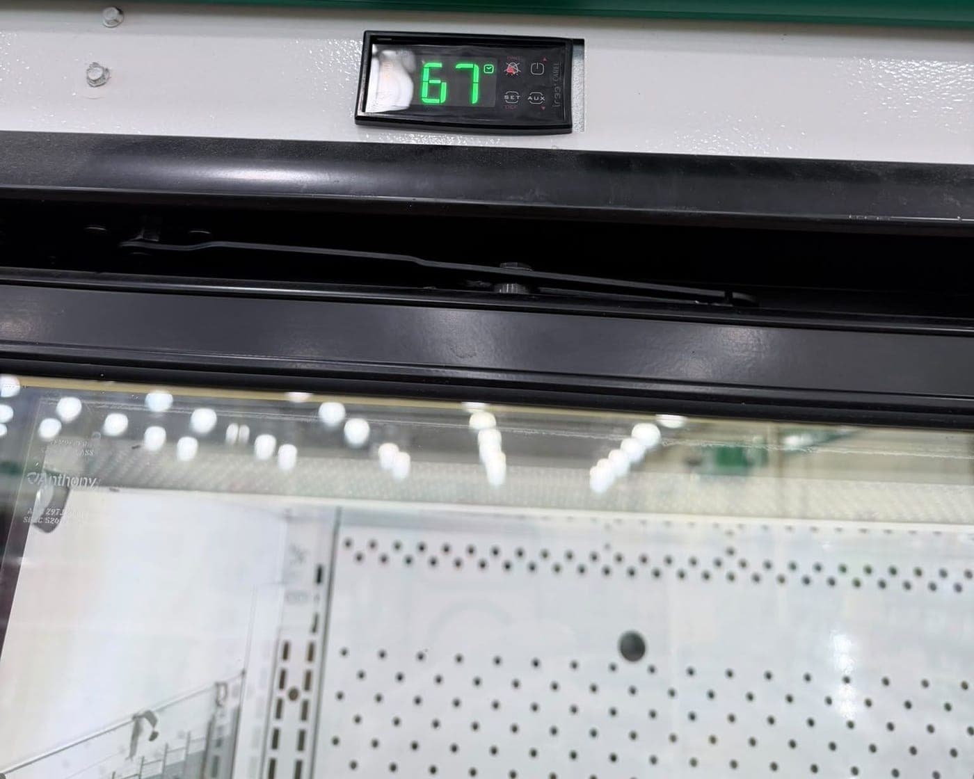 Display freezer temperature reading 67 degrees