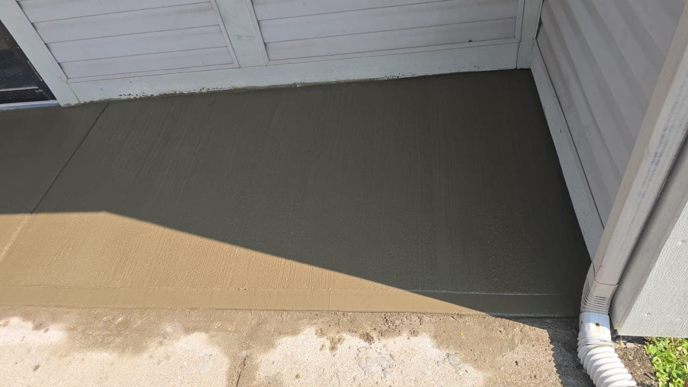 New broom-finished concrete at the same entry