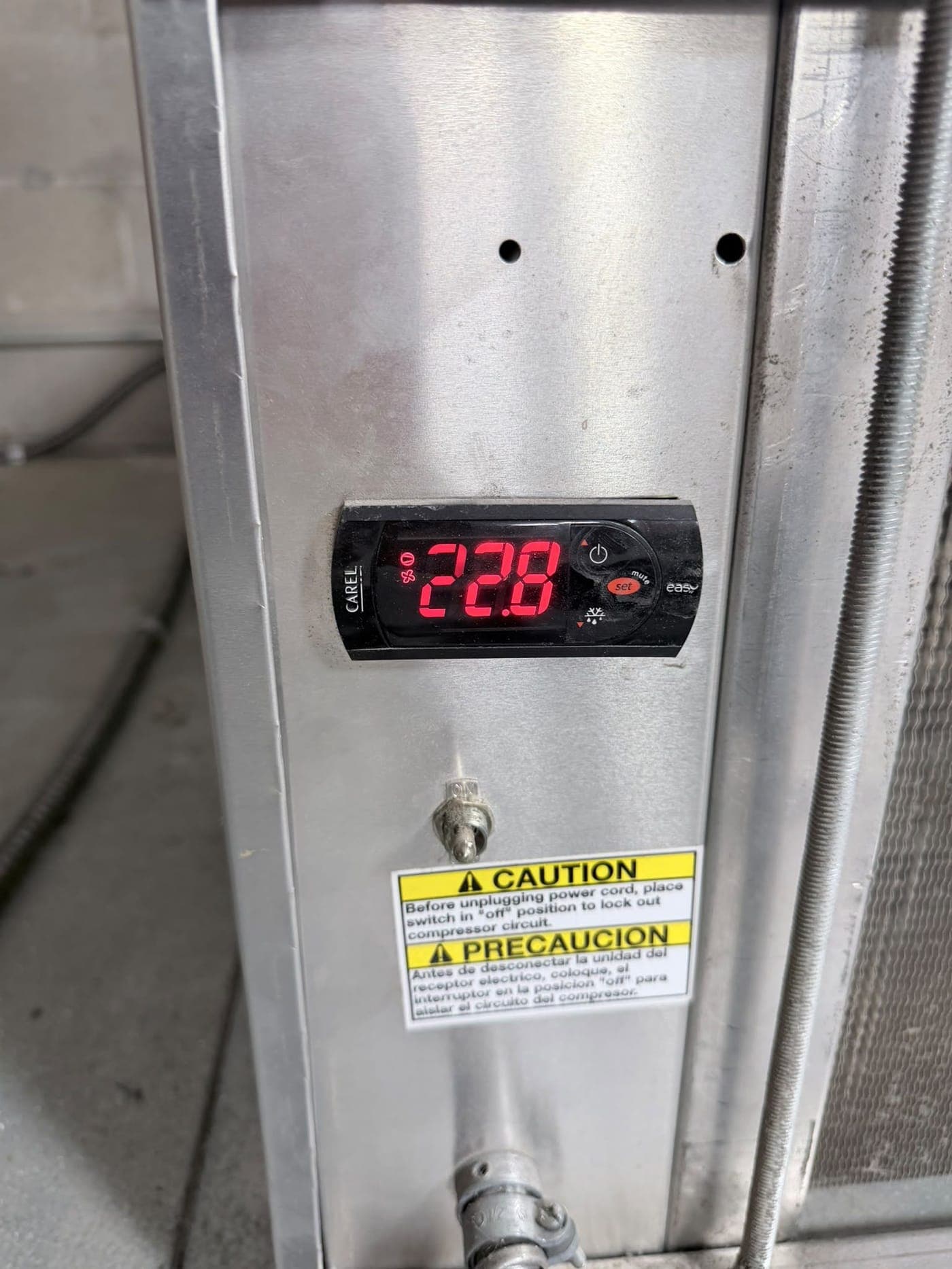 Walk-in freezer controller display reading 22.8 degrees