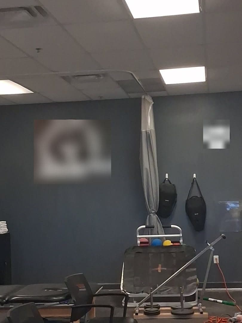 The same wall repainted in an even dark gray