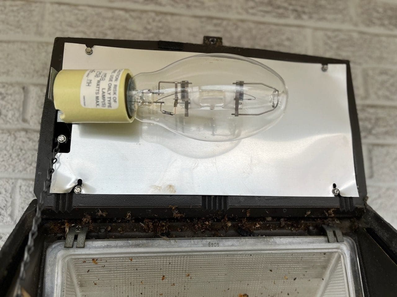 New lamp installed in the same wall light fixture