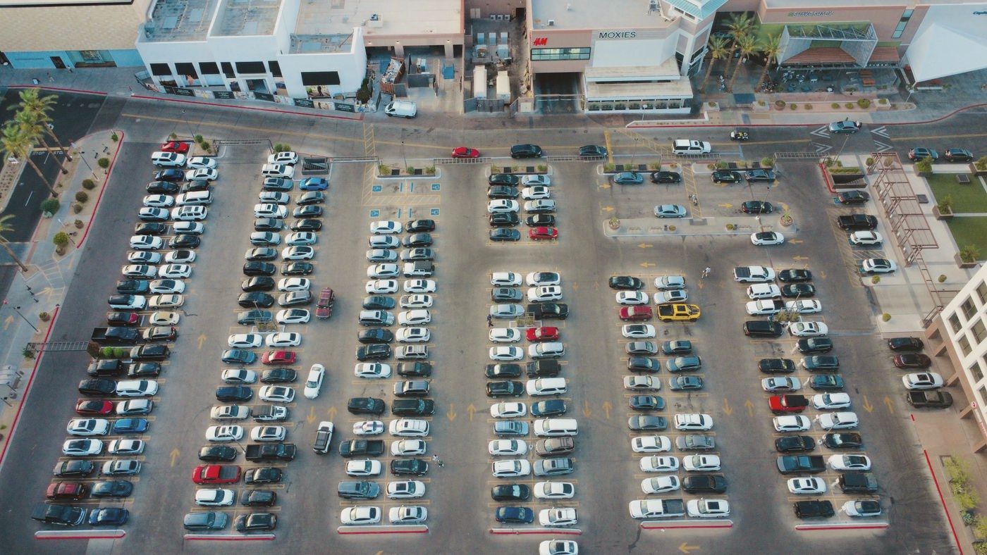 Aerial view of a shopping center parking lot